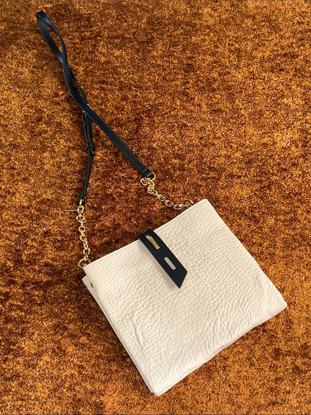 Cream Crossbody Bag with Black Strap and Gold Chain Accent